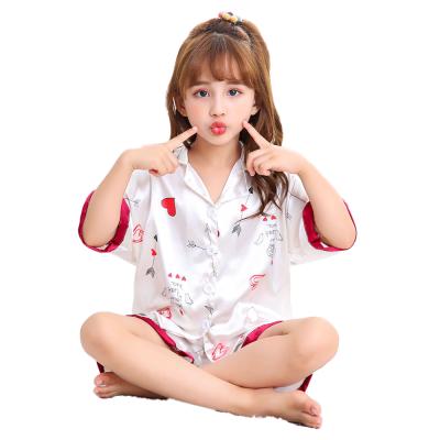 China Wholesalers Soft And Smooth Unisex Girl's Ice Silk Pajamas High Quality Breathable Polyester Fabric for sale