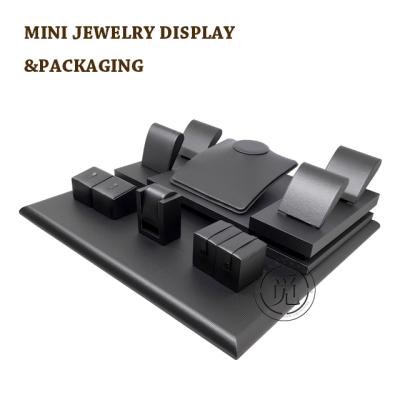 China OEM+ODM+Wholesale Black Leather Jewelry Display Clips Mini Necklace Rings Jewelry Display Sets for sale