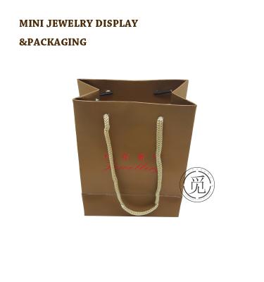 China Recyclable Economic Cheap Paper Bags With Handles Craft Paper Bag for sale