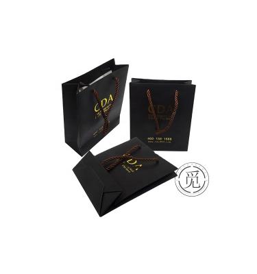 China Recyclable Customized Logo Gold Stamping Kraft Paper Bags Wholesales Jewelry Packaging Bags for sale