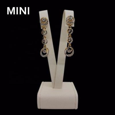 China Newest long earrings metal beige leather fashion earring display stand for sale for sale