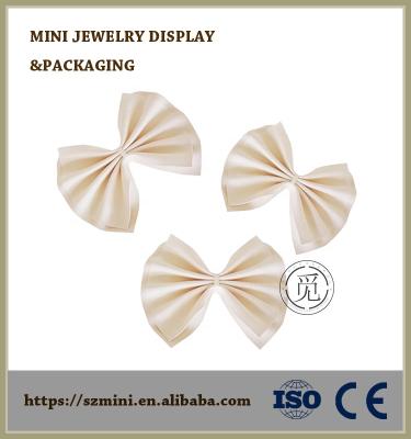 China OEM+ODM+Wholesale Mini Ring Display Bowknot Decoratation For Jewelry Counter for sale