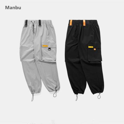 China 2018 New Wholesale Fashion Pockets Material Track Material Men'S Casual Windbreaker Breathable Sliver Pants for sale