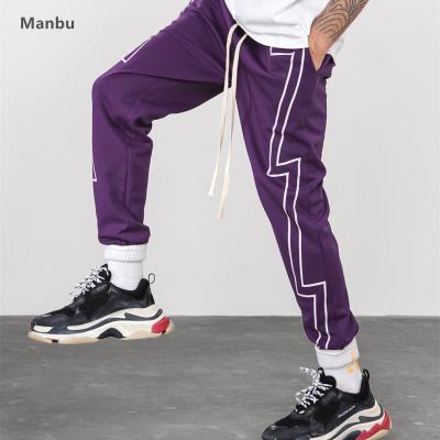 China Latest Autumn Fashion Breathable Men Retro Printed Jogger Tactical Pants for sale