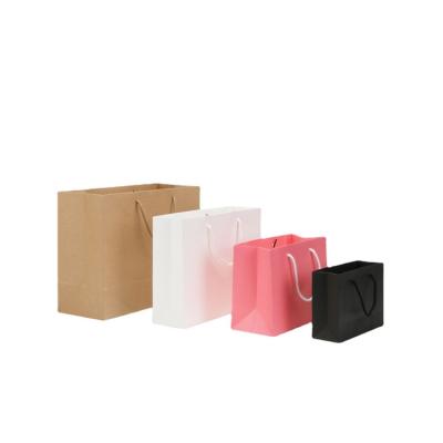 China High Quality Custom Wholesale Price Smooth Surface Disposable Kraft Paper Bags With Rope Handle Paper Bag for sale