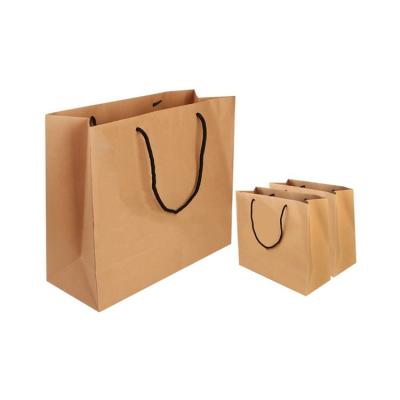 China Printing Logo Smooth Surface Kraft Smooth Surface Paper Custom Bag With Handle for sale