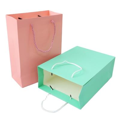 China Recyclable Custom Logo Shopping Handle Kraft Paper Bag With Blue And Pink Different Color For Gift Packaging for sale