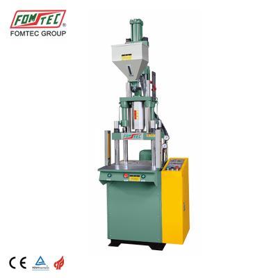 China Electronic mobile car plastic cake injection machine VERTICAL FOMTEC injection machine small price VERTICAL for sale