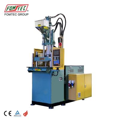 China VERTICAL FOMTEC 800 kN table top standard plastic injection molding machine used mini injection molding machine for sale