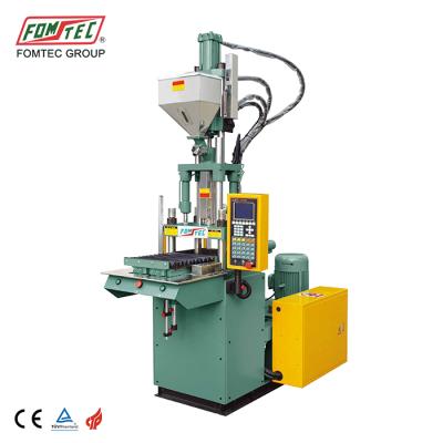 China FOMTEC small VERTICAL plastic injection molding machine used machinery for sale for sale