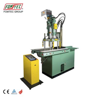 China 40TON tube shoulder injection molding machine bolo VERTICAL molding machine for sale