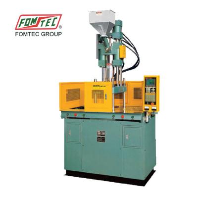 China VERTICAL 60 Ton Double Sliding Table Vertical Injection Molding Machine for sale