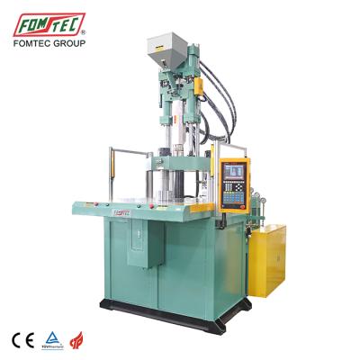 China 1200 kN VERTICALE Rotary Table Two Molds 3 Molds Injection Molding Cover Machine Vertical Manufacturing Machinery Motor for sale