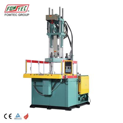 China FOMTEC VERTICAL 1600 kN rotary table injection molding machine one stage injection stretch injection plastic vertical blow molding machine pe for sale