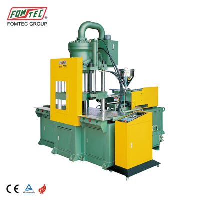 China VERTICAL 2100 kN OVER MOLD FILE VERTICAL PLASTIC MOLDING MACHINE WITH CE for sale