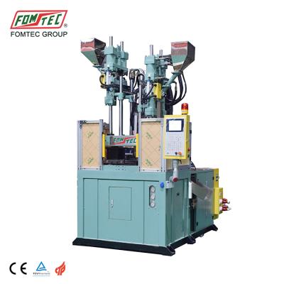 China FOMTEC VERTICAL Four Colors Vertical Plastic Injection Molding Machine Dental Floss Pick Making Machine for sale