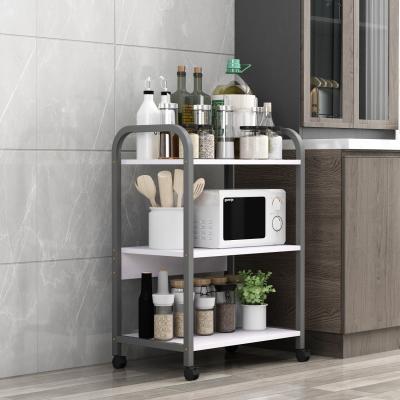 China Steel Wood 3/4/5 Layer Stainless Steel Wooden Kitchen Multifunctional Super Practical Shelf for sale