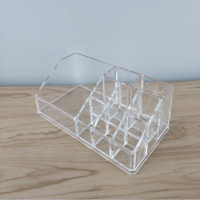 China Daily Multifunctional Clear Storage Box Display Rack Acrylic Cosmetic Necessities Display Stand for sale