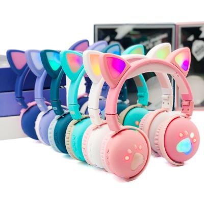 China New BT Claw Cat Macaroons Headphones Cute Wireless Ears Wireless Headset Alive Voice Call for sale