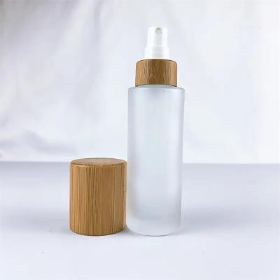 中国 Glass Shampoo Cosmetic spray Pump Bottle With Bamboo Cap 販売のため