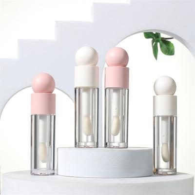 Cina Cosmetic bottle for Lip Balm Round Empty Crown Plastic Lip Gloss Oil Packaging Tubes in vendita