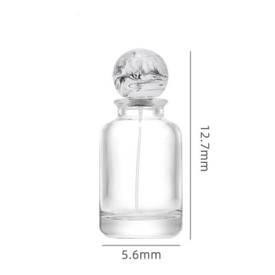 China 30ml 50ml 100ml unique spray empty perfume bottle glass bottle à venda