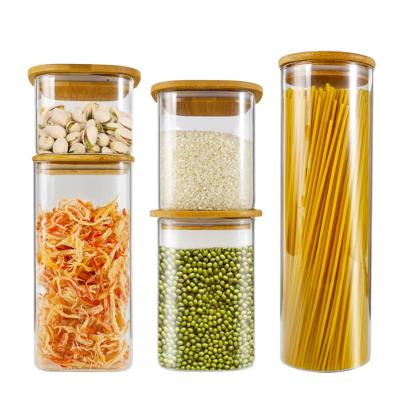 China Food Storage Containers 30ml Borosilicate Glass Spice Jar With Bamboo Lids for sale