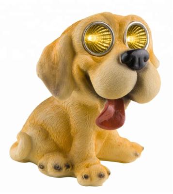 China Europe Solar Powered Animal Garden Ornaments Funny Resin Dog Statues for sale