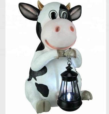 China Farmhouse Minimalist Cow Standing Solar LED Garden Light Decor Animal Garden Ornaments Garden Statues for sale