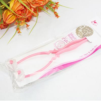 China Face 2019 Wholesale Hand Held Manual Two Roller Mini Facial Massager For Promotion for sale