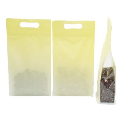 China Recyclable Custom Printing Multi-Sizes and Colors Double Side Matte Gusset Base Grip Seal Bags with Die-Cut Handle and Rectangle Window for sale