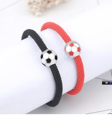 China 2022 fashion student jewelry fashion romantic glue soccer bracelet world cup couples bracelet falling red black for sale