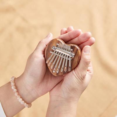 China Cute Stable 8 Teeth Heart Kalimba 8 Keys Kids Musical Instruments for sale