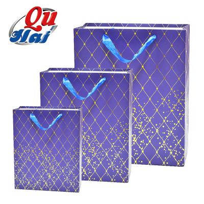 China Recycled Materials New Logo Paper Bag Blue Custom Package Bags Gift Shopping Luxury Gold Foil Paper Bag For Jewelry for sale