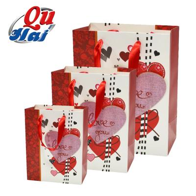 China Materials New Arrival Recycled Luxury Paper Gift Bags Custom Printed Logo Ribbon Handles Valentine Packaging Paper Bag With for sale