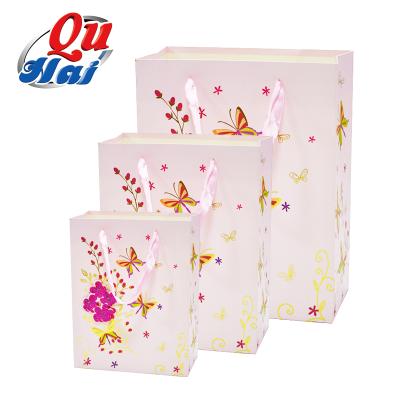 China New Recycled Material Design 3D Color Butterfly Pink Paper Bags With Handles Fancy Small Gift Paper Bag For Clothing for sale