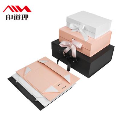 China Recyclable Luxury Paper Christmas Cardboard Custom Decorative Gift Packaging Magnetic Folding Box With Ribbon for sale