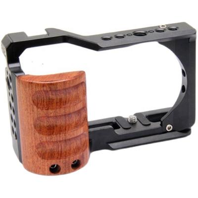 China With New Wooden Handle Upgrade Metal Camera Cage For Sony ZV-E10 Extension Video Cage With Wooden Handle for sale