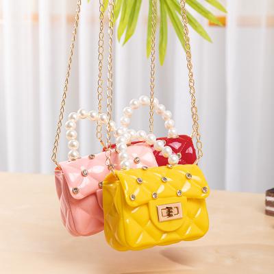 China 2021 fashion casual women mini kids jelly bags silicone candy chain ladies purses messenger bags bead bags small diamond jelly purses and handbags for sale