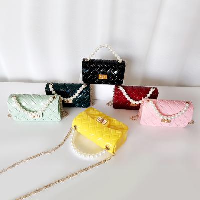 China casual& 2021 Fashion luxury handbags PVC women silicone candy purses bead chain cross - body ladies freeze handbags for sale