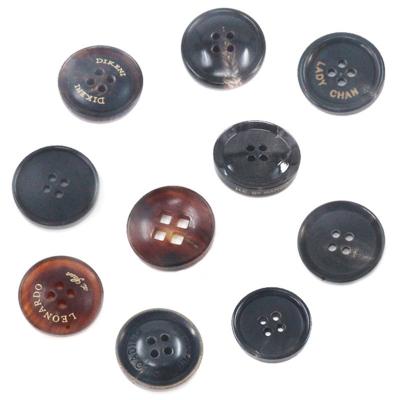 China Viable luxury buttons 4 holes around sewing natural corozo suit buttons for sale