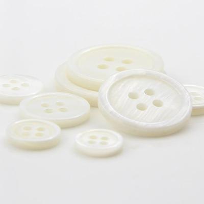 China 4 Hole Agoya Viable Shell Button with Logo Engraved Customized White Pearl Natural Shell Button for sale