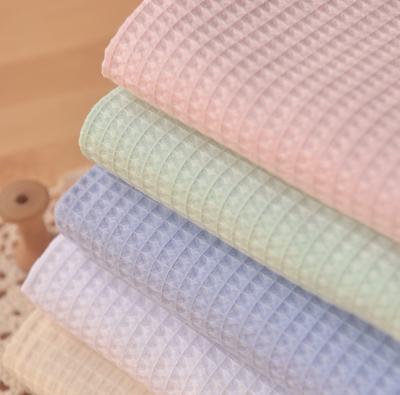 China Breathable High Quality Cotton Customized Waffle Fabric 100% Cotton For Garment Covering Bedding Home Textile Muslin Clothes for sale