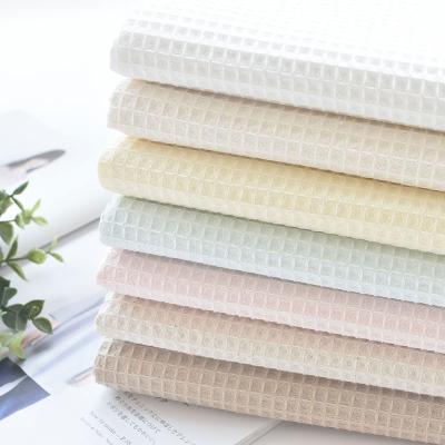 China Double Faced Popular Fabrics Wholesale Waffle Fabric Cotton Solid Color High Quality Yarn Dyed Waffle Fabric For Underwear Garment for sale