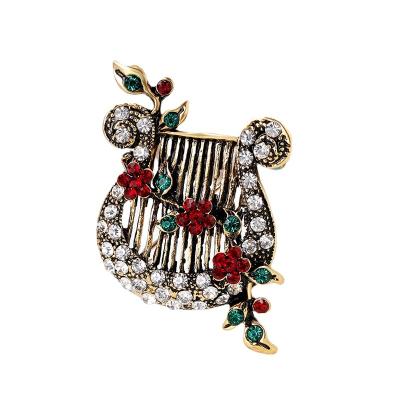 China Crystal Classic Flowers Drop Oil Rhinestone Butterfly Vintage Brooches For Women Brooch Pins Party Jewelry for sale