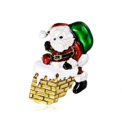 China ALLOY Taking Santa Christmas Brooches For Women Gifts Men Santa Climbs Chimney Figure New Year Brooches for sale