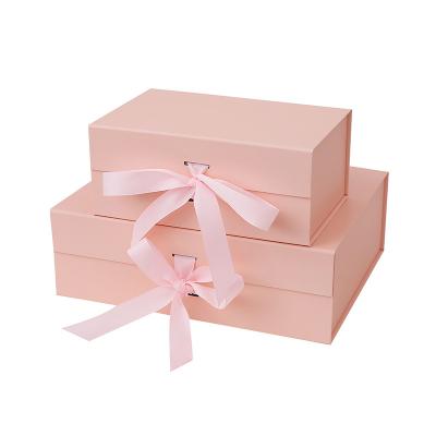 China Handmade Wholesale Custom Pink Luxury Foldable Paper Boxes Gift Box With Ribbon Closure for sale