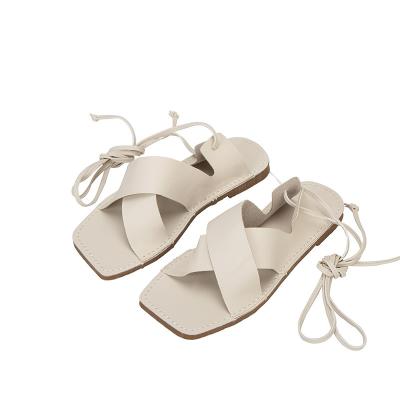 China Fashion trend Amazon summer sandals 2022 new sandals with straps and flat lace-up Roman sandals for sale