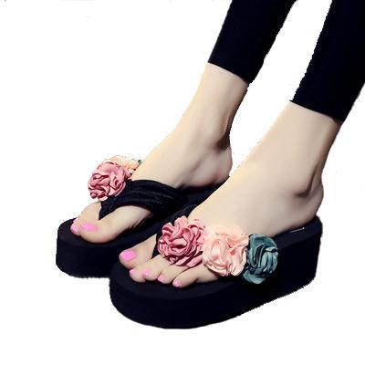 China Fashion trend 2020 summer new flower handmade women's thick bottom flip flops non - slip beach shoes fish high heel cool slippers for sale