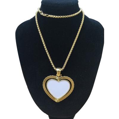 China High Quality Logo Angle Wings Heart Key Logo Rhinestone Jewelry Sublimation Blank Rotating Chain Pendant Necklace For Hip Hop for sale